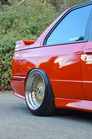 back side shot of a red BMW