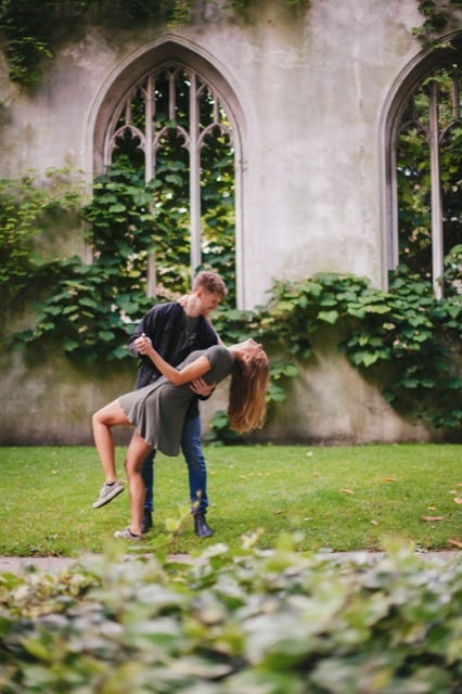 Man dips his fiancé after successfully proposing to her for an engagement photoshoot by perfocal