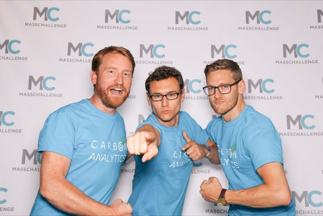 3 team employees take fighting poses for a perfocla photographer at masschallenge