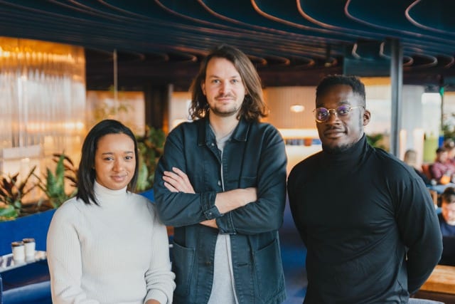 2 men and one woman pose for their team photoshoot by perfocal