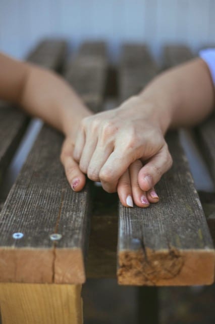 A close up photo of a couple's hands