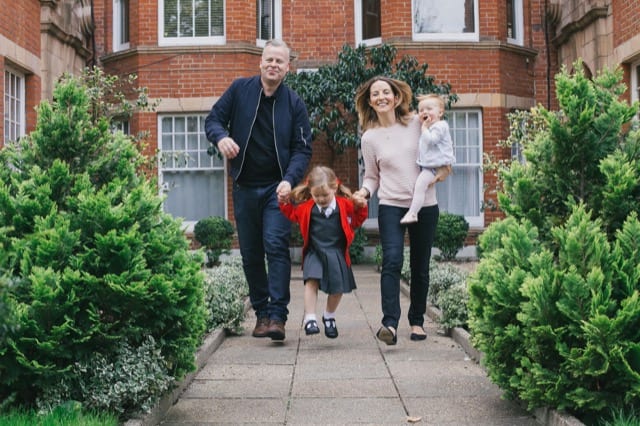whole family walk to the daughters first day of school