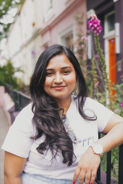 young lady posing for social profile photos in London