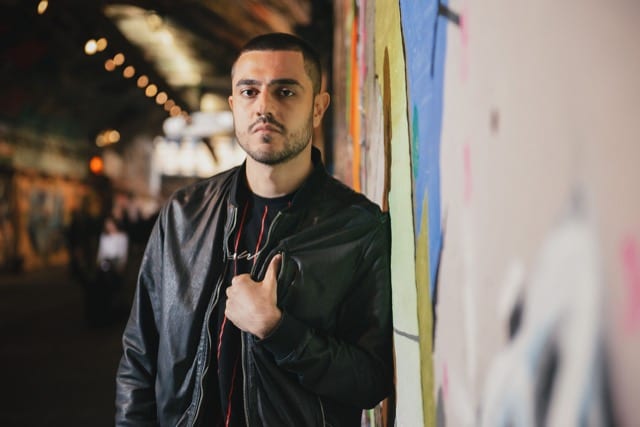 man in black jacket posing for personal photoshoot