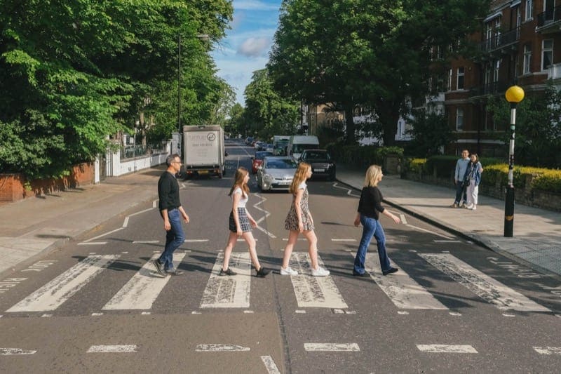 Young family re-create the Beatles' Abbey Road album cover in London