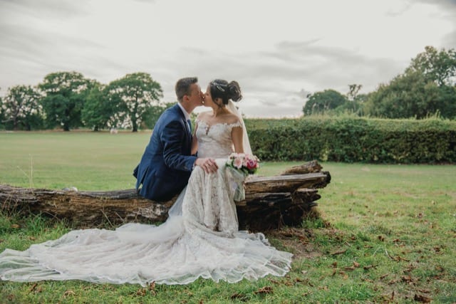Bride and groom kissing after wedding ceremony
