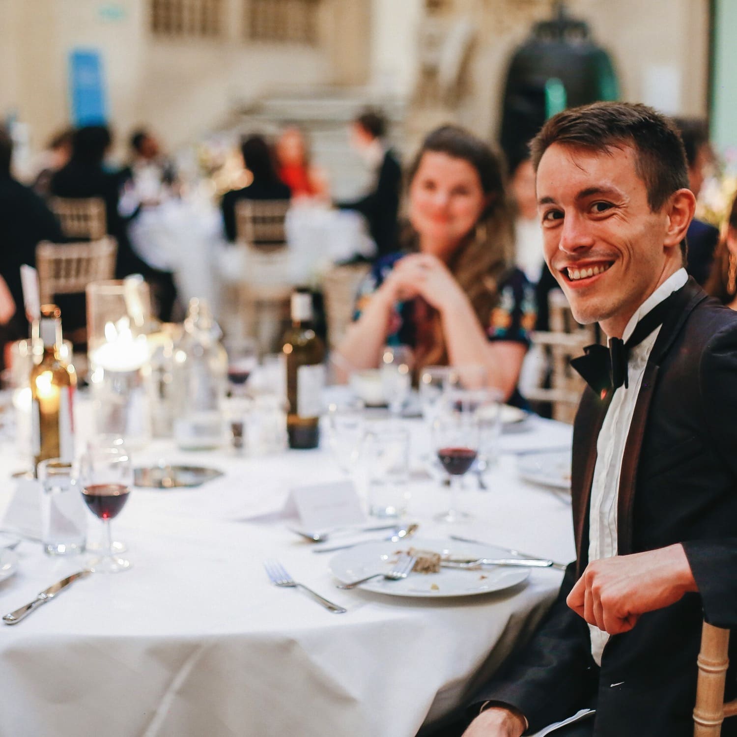 man smiling in a party event