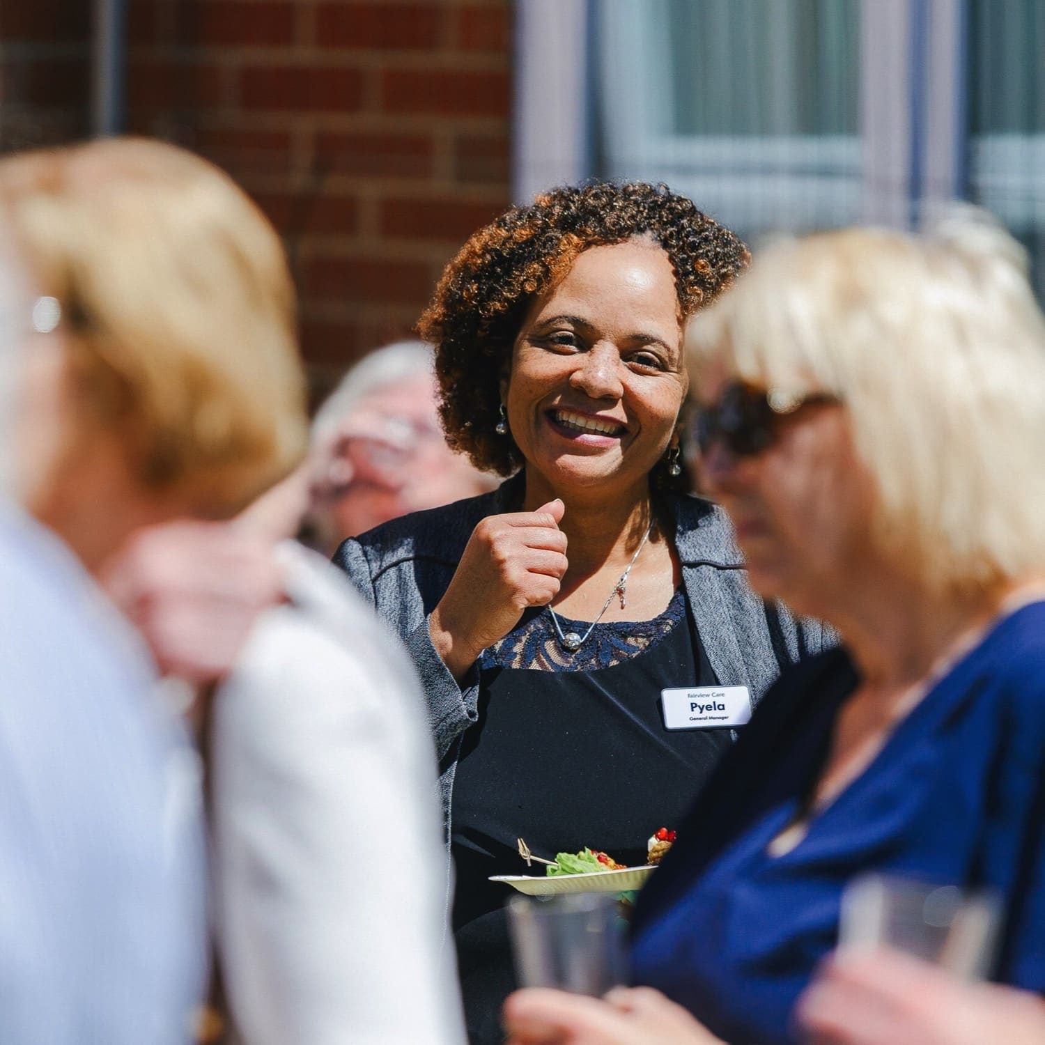 smily woman in a business event
